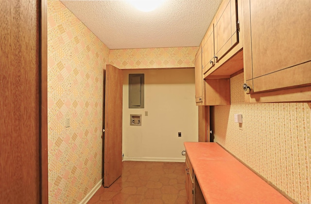 6 Elaine Rd, Sheridan, AR 72150 - hall featuring electric panel, a textured ceiling, wallpapered walls, and tile patterned floors