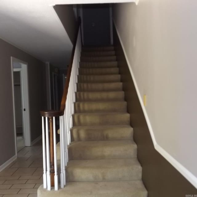 stairway with baseboards