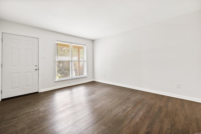 10301 Milkyway Dr, Little Rock, AR 72209 - unfurnished room featuring dark wood finished floors and baseboards