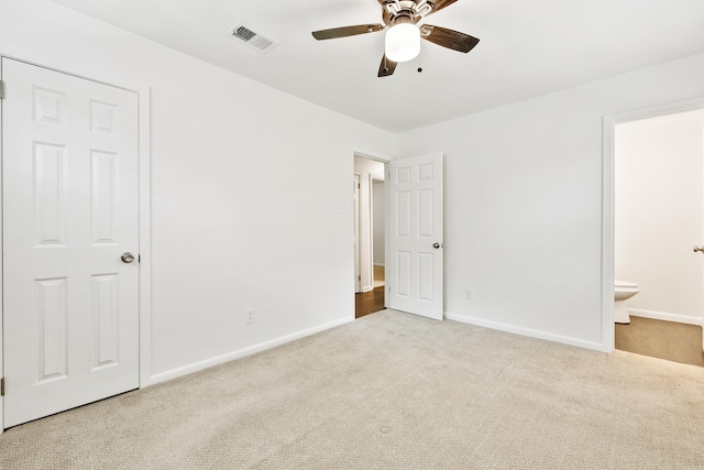 10301 Milkyway Dr, Little Rock, AR 72209 - unfurnished bedroom with carpet floors, ensuite bathroom, and a ceiling fan