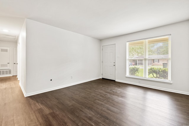 10301 Milkyway Dr, Little Rock, AR 72209 - unfurnished room featuring dark wood finished floors and baseboards