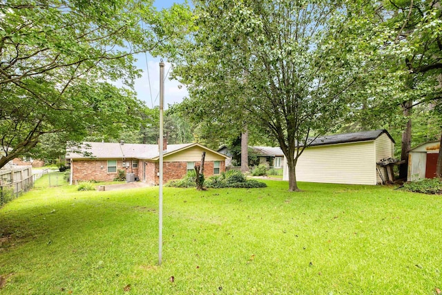 10301 Milkyway Dr, Little Rock, AR 72209 - view of yard featuring a shed