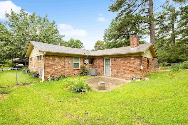 10301 Milkyway Dr, Little Rock, AR 72209 - rear view of property with a patio area, brick siding, a chimney, and a gate
