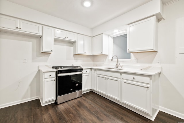 10301 Milkyway Dr, Little Rock, AR 72209 - kitchen featuring stainless steel gas range oven, dark wood-style floors, white cabinets, and recessed lighting