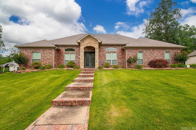 909 Nature Way, Benton, AR 72019 - french country inspired facade with french doors, a front yard, roof with shingles, and brick siding