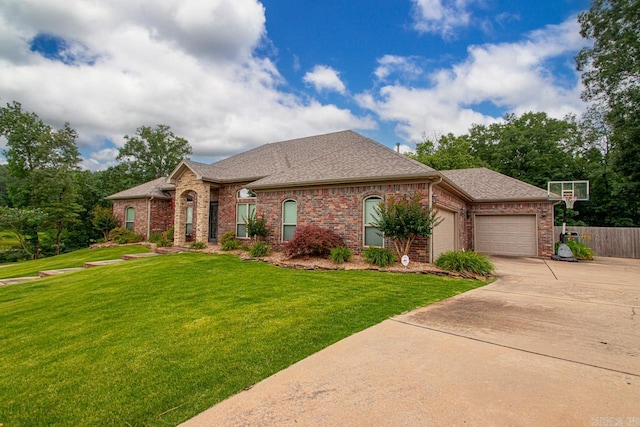909 Nature Way, Benton, AR 72019 - view of front of property with brick siding, a garage, a shingled roof, and concrete driveway