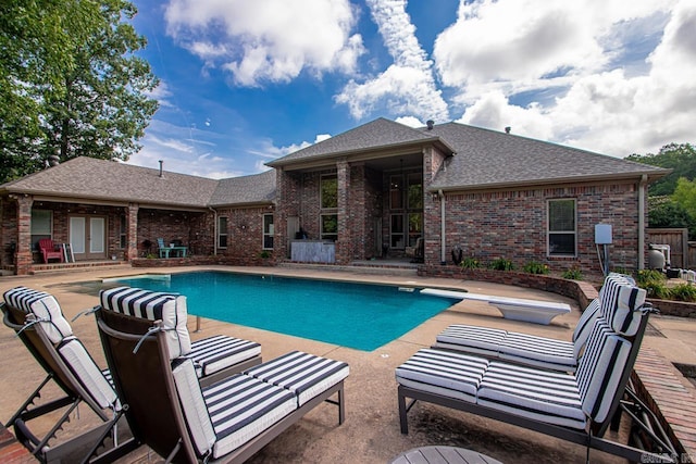 909 Nature Way, Benton, AR 72019 - view of swimming pool with a patio area and a diving board