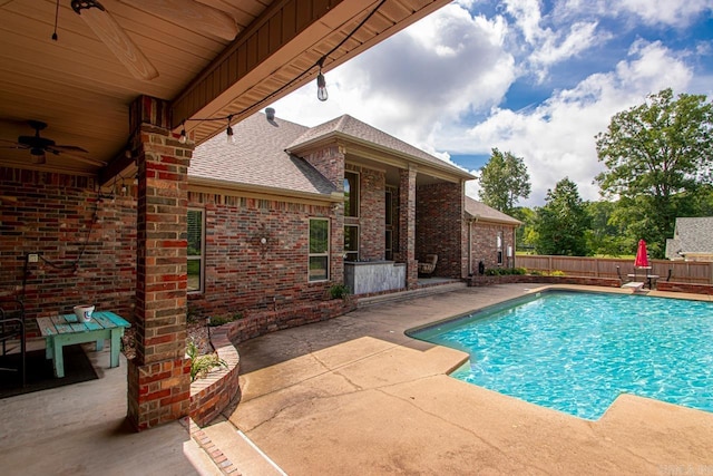 909 Nature Way, Benton, AR 72019 - view of swimming pool featuring a ceiling fan, a patio area, a fenced backyard, and a diving board