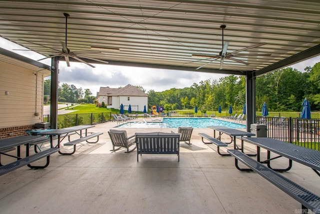 909 Nature Way, Benton, AR 72019 - view of patio / terrace featuring ceiling fan and a community pool