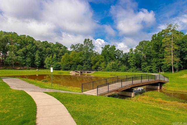 909 Nature Way, Benton, AR 72019 - view of community featuring a lawn, a water view, and a view of trees