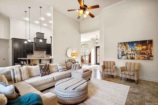 909 Nature Way, Benton, AR 72019 - living area featuring a high ceiling, ornamental molding, and ceiling fan