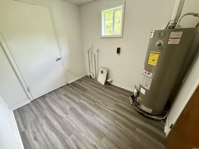 131 N Pine St, Salem, AR 72576 - utility room with gas water heater