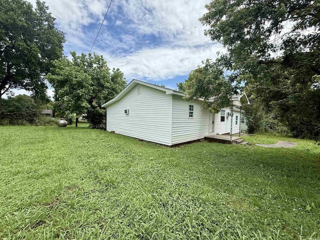 131 N Pine St, Salem, AR 72576 - back of property with a deck and a lawn