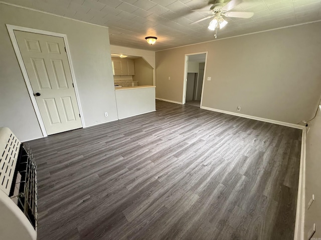 131 N Pine St, Salem, AR 72576 - unfurnished living room featuring ceiling fan and dark wood-style flooring