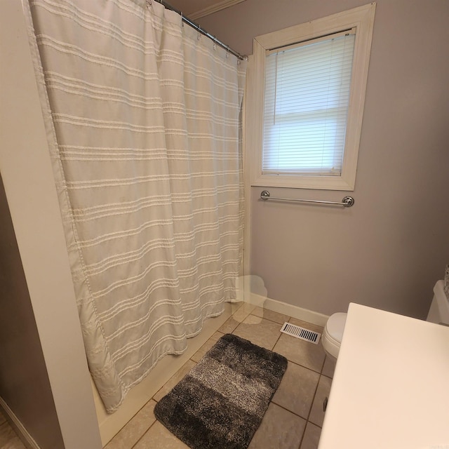 1407 W Front St, Heber Springs, AR 72543 - bathroom featuring tile patterned floors and a shower with curtain