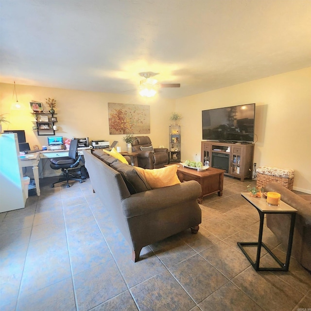 1407 W Front St, Heber Springs, AR 72543 - tiled living room with a desk and ceiling fan