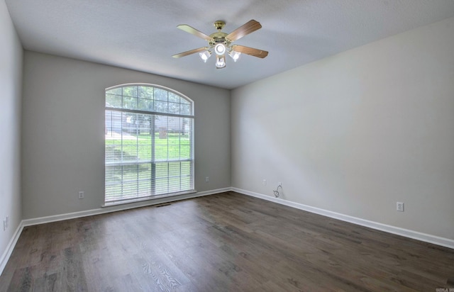 12825 Westglen Dr, Little Rock, AR 72211 - spare room featuring ceiling fan and dark wood-type flooring