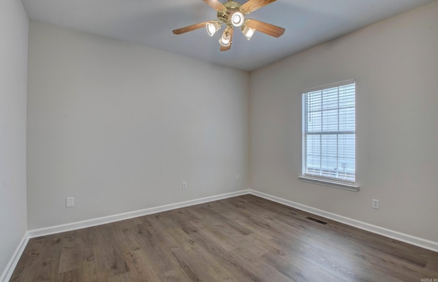 12825 Westglen Dr, Little Rock, AR 72211 - unfurnished room featuring dark wood-style floors and ceiling fan
