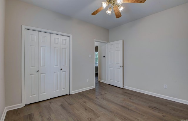 12825 Westglen Dr, Little Rock, AR 72211 - unfurnished bedroom with wood finished floors, a closet, and ceiling fan