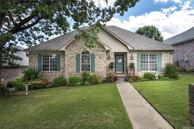 1315 Gleneagles Ct, Little Rock, AR 72211 - view of front of home with a front lawn, brick siding, and a shingled roof