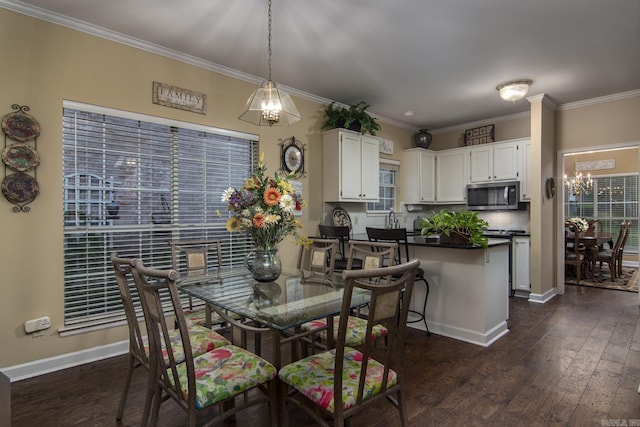 1315 Gleneagles Ct, Little Rock, AR 72211 - dining space featuring dark wood-type flooring, a chandelier, and ornamental molding