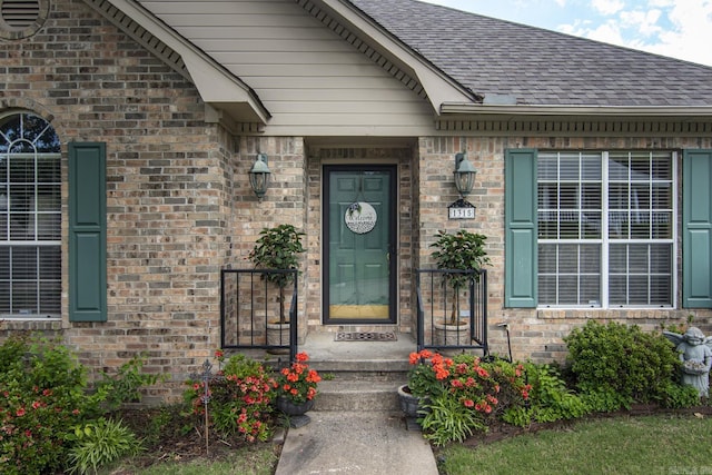 1315 Gleneagles Ct, Little Rock, AR 72211 - entrance to property featuring brick siding and a shingled roof