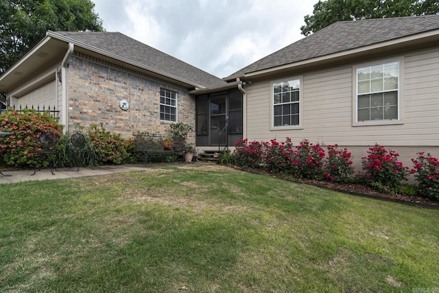 1315 Gleneagles Ct, Little Rock, AR 72211 - view of front facade with a front lawn, a shingled roof, and a garage