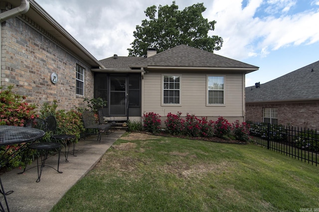 1315 Gleneagles Ct, Little Rock, AR 72211 - rear view of property featuring a chimney, entry steps, and roof with shingles