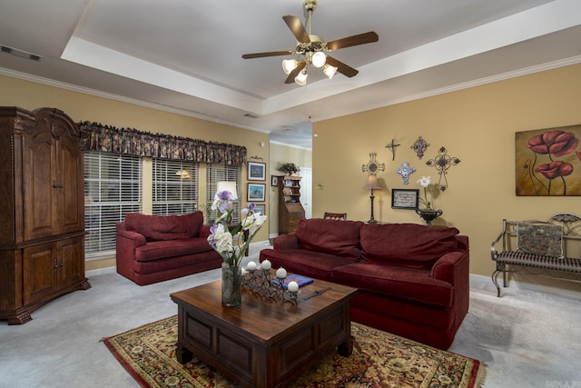 1315 Gleneagles Ct, Little Rock, AR 72211 - living area with light colored carpet, a raised ceiling, ceiling fan, and crown molding