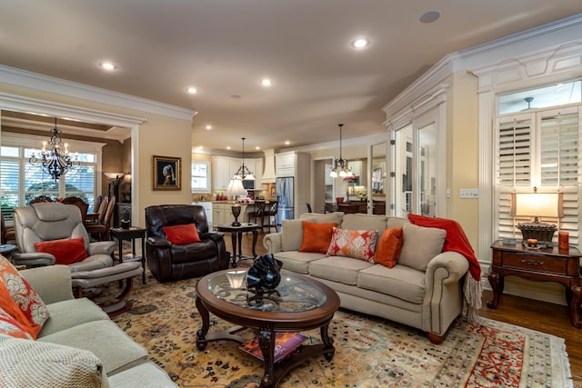 103 Falata Cir, Little Rock, AR 72223 - living room featuring a chandelier, ornamental molding, wood finished floors, and recessed lighting