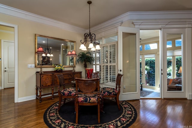 103 Falata Cir, Little Rock, AR 72223 - dining room featuring wood finished floors, a chandelier, and crown molding
