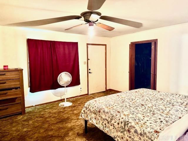 119 N 20th St, Arkadelphia, AR 71923 - carpeted bedroom with a ceiling fan