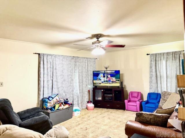 119 N 20th St, Arkadelphia, AR 71923 - living area with ceiling fan and carpet