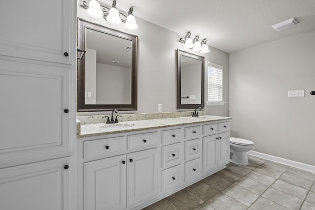 36 Fletcher Dr, Austin, AR 72007 - bathroom featuring double vanity and tile patterned flooring