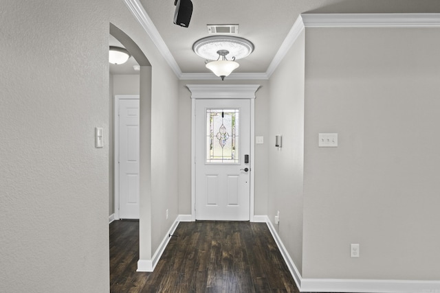 36 Fletcher Dr, Austin, AR 72007 - entryway featuring arched walkways, wood finished floors, and ornamental molding