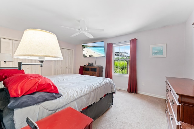 301 Forest Dr, Mountain Home, AR 72653 - bedroom featuring light carpet, ceiling fan, and a closet