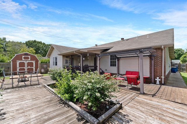 301 Forest Dr, Mountain Home, AR 72653 - wooden terrace with a storage unit and a pergola