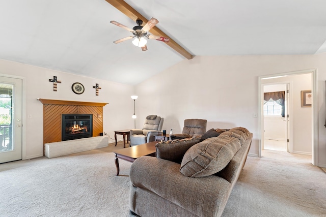 301 Forest Dr, Mountain Home, AR 72653 - carpeted living room featuring a fireplace, ceiling fan, and plenty of natural light