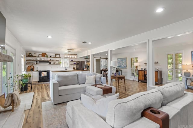4 Coachlight Cir, Little Rock, AR 72227 - living area with light wood-style floors and recessed lighting