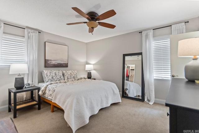 4 Coachlight Cir, Little Rock, AR 72227 - carpeted bedroom featuring baseboards and ceiling fan