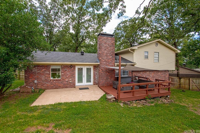 4 Coachlight Cir, Little Rock, AR 72227 - back of property featuring french doors, brick siding, a chimney, a deck, and a patio