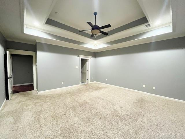 107 Marie Jeanne Dr, Maumelle, AR 72113 - carpeted spare room with a tray ceiling and a ceiling fan