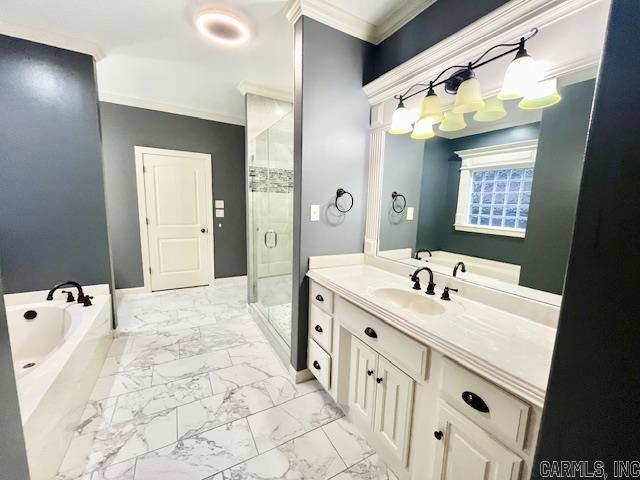 107 Marie Jeanne Dr, Maumelle, AR 72113 - bathroom with crown molding, a shower stall, vanity, marble finish flooring, and a garden tub