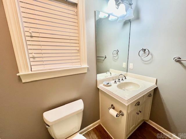 107 Marie Jeanne Dr, Maumelle, AR 72113 - half bath featuring vanity and wood finished floors