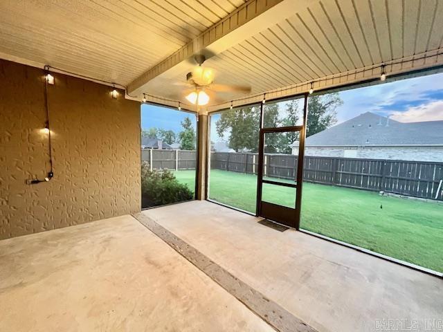 107 Marie Jeanne Dr, Maumelle, AR 72113 - unfurnished sunroom featuring beamed ceiling and healthy amount of natural light
