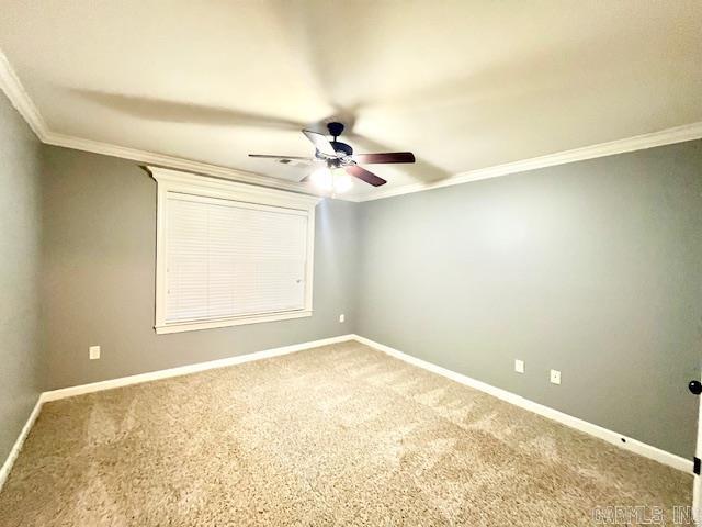 107 Marie Jeanne Dr, Maumelle, AR 72113 - carpeted empty room featuring crown molding and a ceiling fan