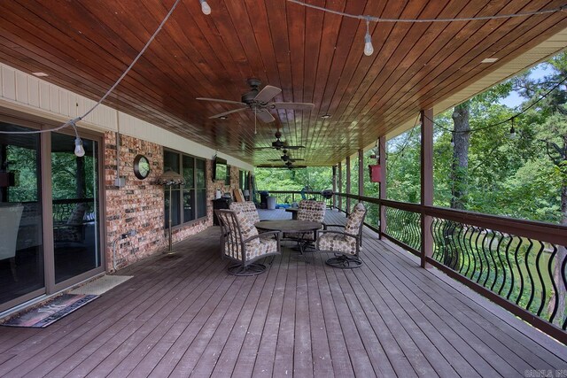 121 Atkinson Ln, Hot Springs, AR 71913 - deck with outdoor dining area and ceiling fan