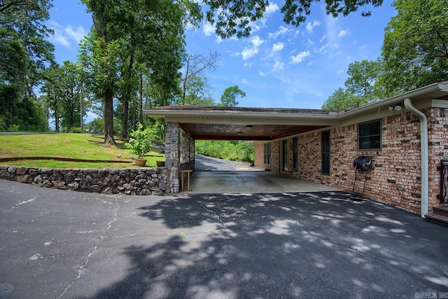 121 Atkinson Ln, Hot Springs, AR 71913 - view of car parking with driveway and a carport
