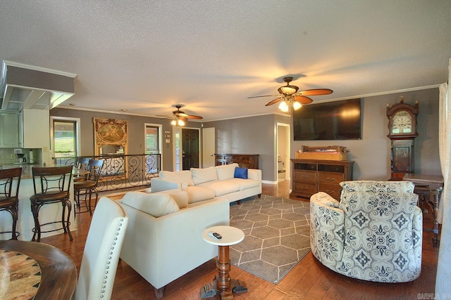 121 Atkinson Ln, Hot Springs, AR 71913 - living room with crown molding, a ceiling fan, wood finished floors, and a textured ceiling