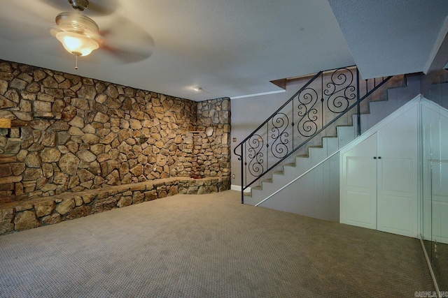 121 Atkinson Ln, Hot Springs, AR 71913 - unfurnished living room with carpet, stairway, and a ceiling fan